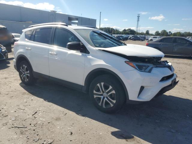 JTMZFREV4HJ130819 - 2017 TOYOTA RAV4 LE WHITE photo 4