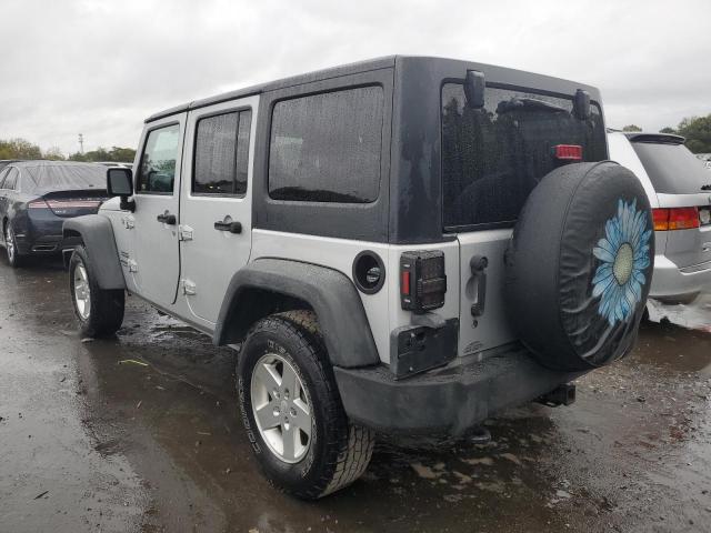 1J4HA3H13BL551212 - 2011 JEEP WRANGLER U SPORT Silber Foto 2