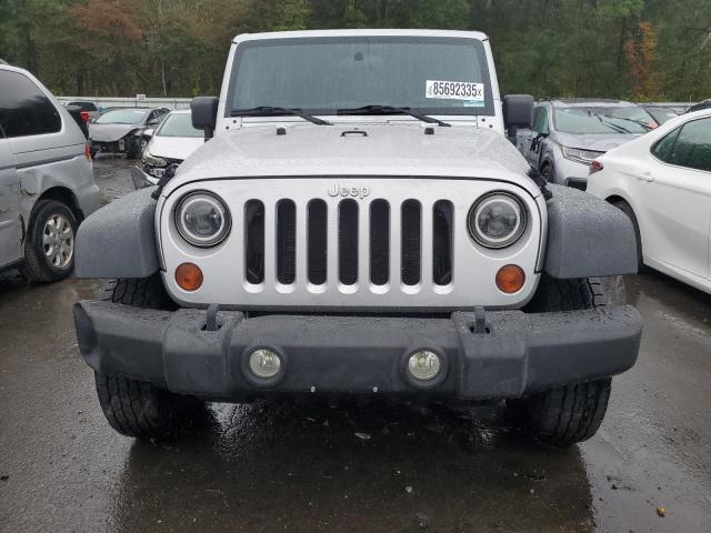 1J4HA3H13BL551212 - 2011 JEEP WRANGLER U SPORT Silber Foto 5