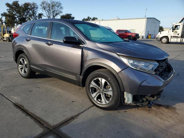 2HKRW6H37KH221883 - 2019 HONDA CR-V LX Grau Foto 4