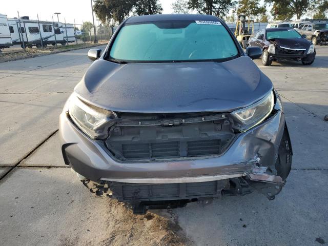 2HKRW6H37KH221883 - 2019 HONDA CR-V LX Grau Foto 5