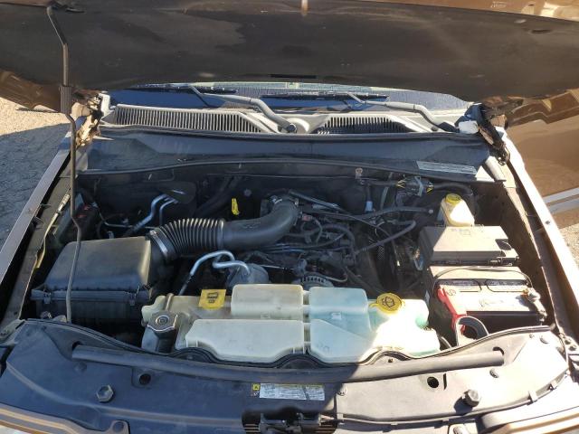 1C4PJMAK7CW139031 - 2012 JEEP LIBERTY SPORT BROWN photo 11