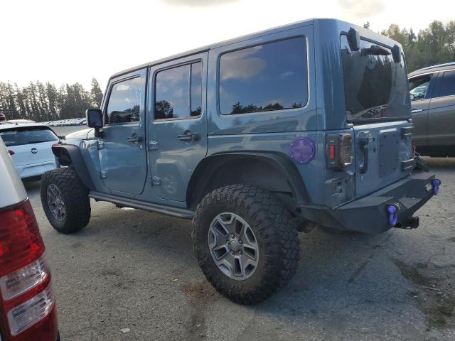 1C4BJWEG1EL107319 - 2014 JEEP WRANGLER U SAHARA GRAY photo 2