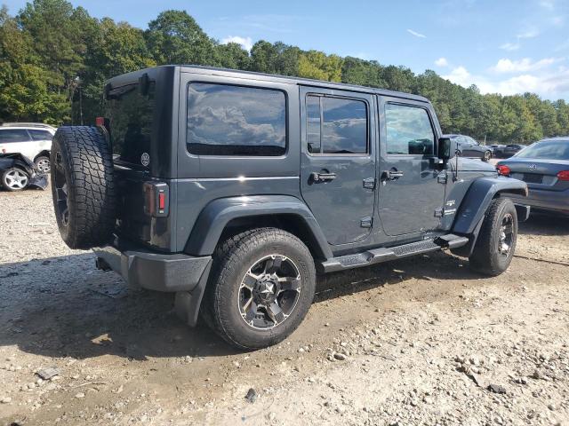 1C4BJWEG0HL557001 - 2017 JEEP WRANGLER U SAHARA GRAY photo 3