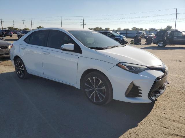 5YFBURHE8JP807584 - 2018 TOYOTA COROLLA L თეთრი ფოტო 4