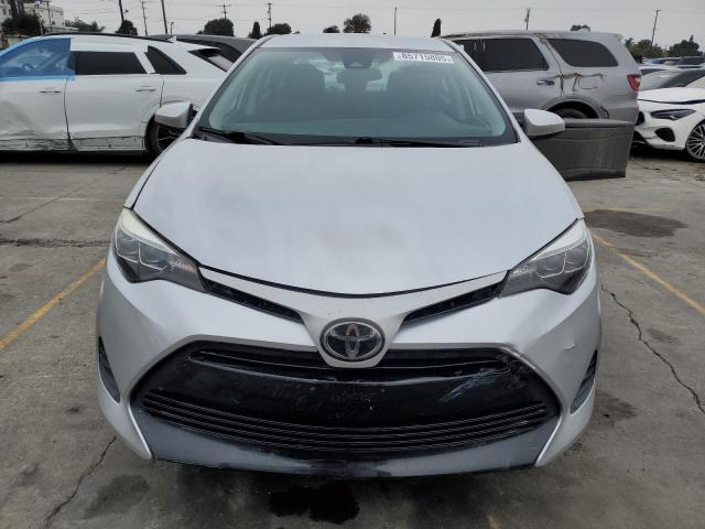 5YFBURHE8KP939259 - 2019 TOYOTA COROLLA L SILVER photo 5