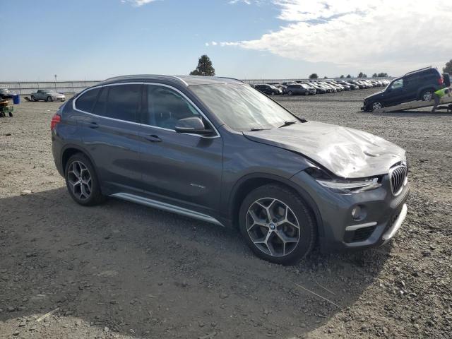 WBXHT3Z3XG4A50129 - 2016 BMW X1 XDRIVE28I GRAY photo 4
