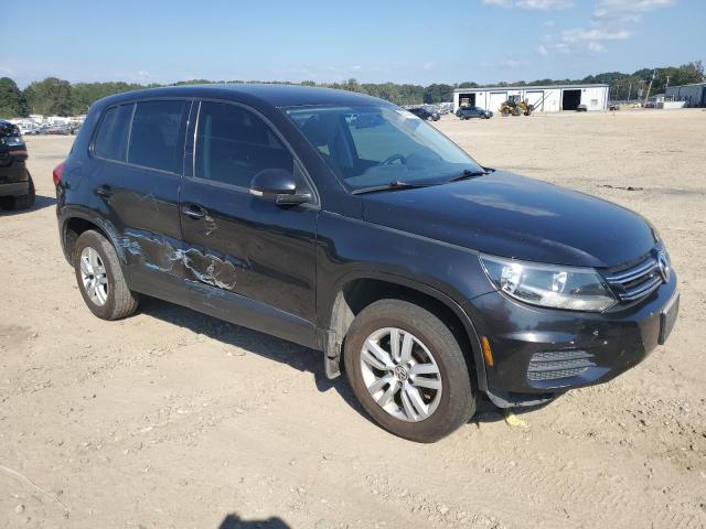 WVGBV3AX4DW613356 - 2013 VOLKSWAGEN TIGUAN S BLACK photo 4