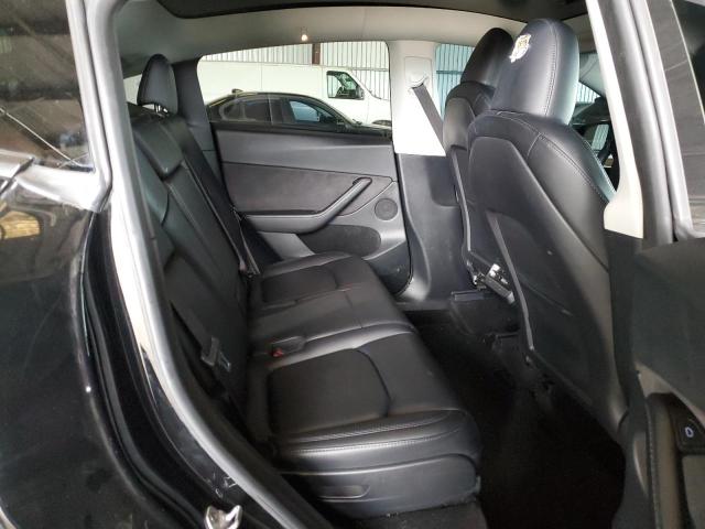 7SAYGAEE1PF926673 - 2023 TESLA MODEL Y Schwarz Foto 10