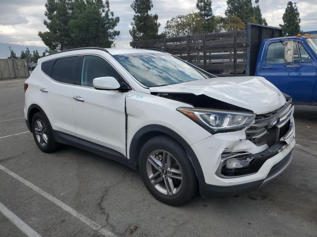 5NMZU3LB9HH031155 - 2017 HYUNDAI SANTA FE S WHITE photo 4