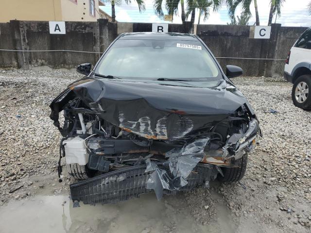 5YFBURHE7KP856325 - 2019 TOYOTA COROLLA L შავი ფოტო 5