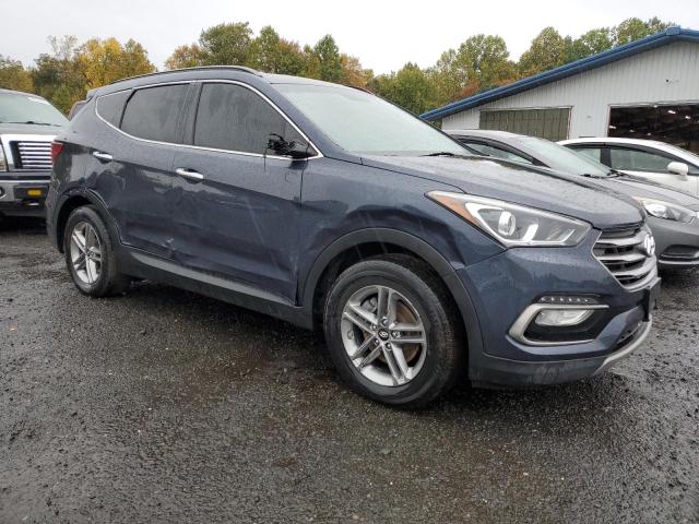 5NMZUDLB1HH030670 - 2017 HYUNDAI SANTA FE S BLUE photo 4
