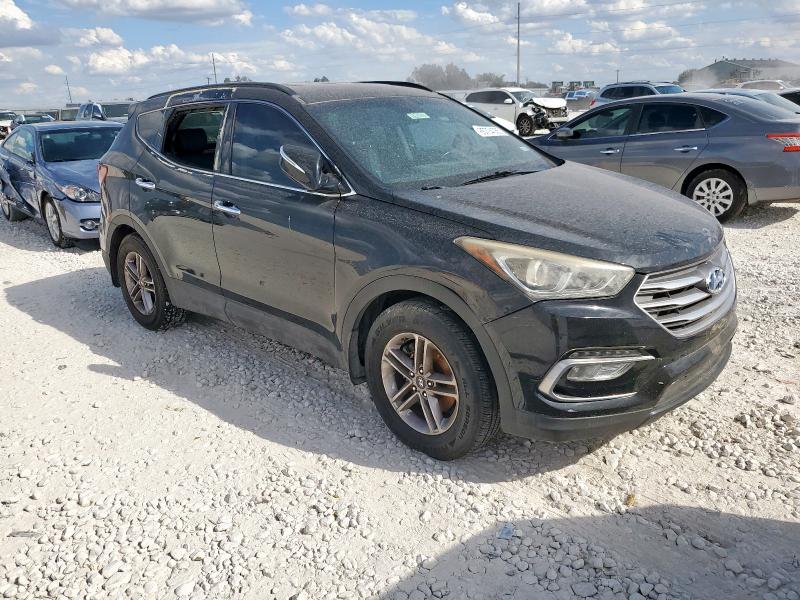 5NMZU3LB9HH007969 - 2017 HYUNDAI SANTA FE S BLACK photo 4