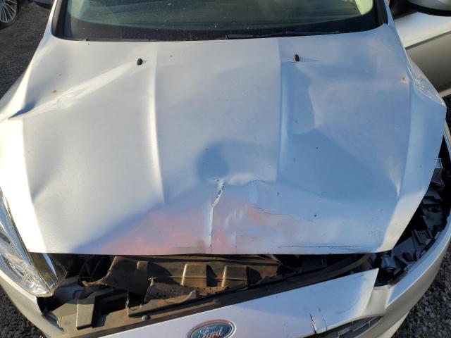 1FADP3F27JL329095 - 2018 FORD FOCUS SE ვერცხლისფერი ფოტო 11