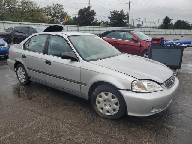 1HGEJ6674XL017131 - 1999 HOND CIVIC LX SILVER photo 4