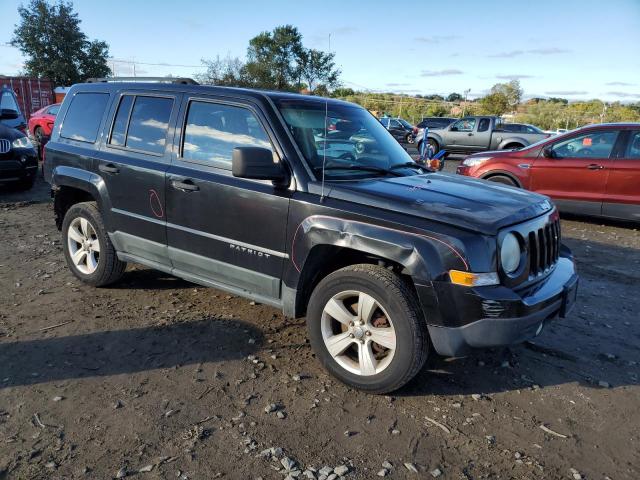 1J4NF1GB4BD225982 - 2011 JEEP PATRIOT SPORT BLACK photo 4