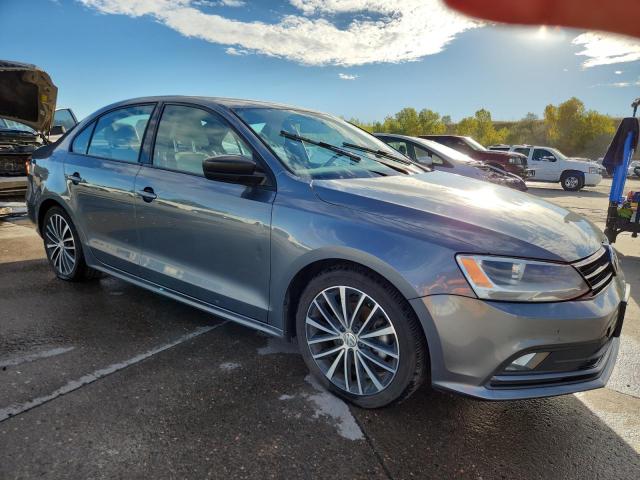 3VWD17AJ1GM380291 - 2016 VOLKSWAGEN JETTA SPORT ნაცრისფერი ფოტო 4