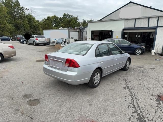 1HGES16552L026055 - 2002 HONDA CIVIC LX SILVER photo 4