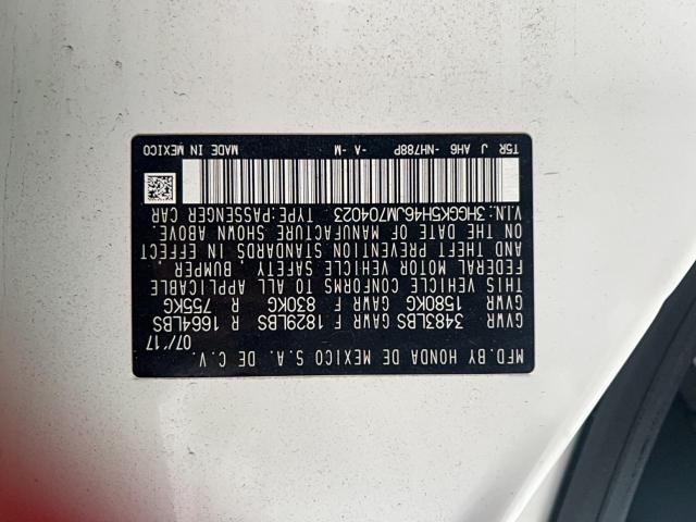 3HGGK5H46JM704023 - 2018 HONDA FIT LX WHITE photo 10