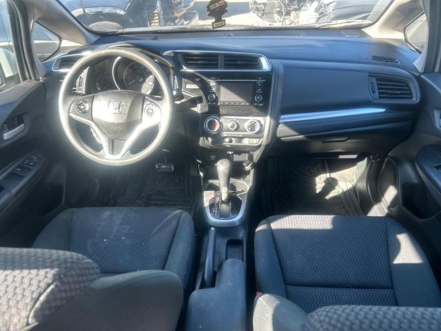 3HGGK5H46JM704023 - 2018 HONDA FIT LX WHITE photo 9