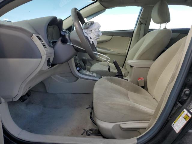 2T1BU4EE2AC533001 - 2010 TOYOTA COROLLA BASE Schwarz Foto 7