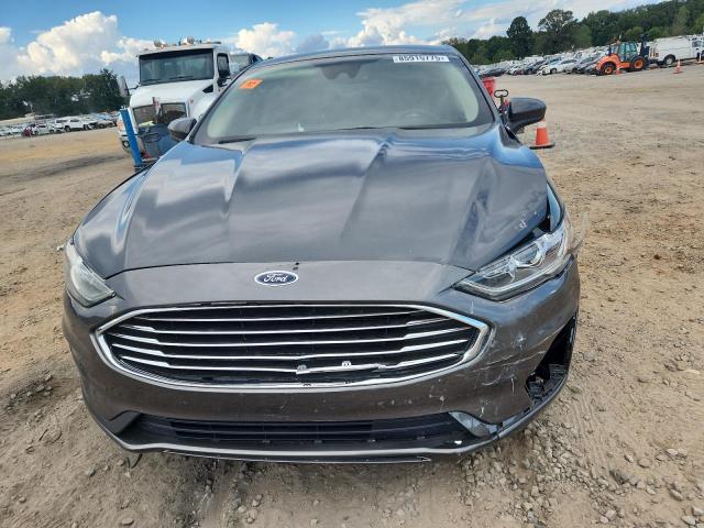 3FA6P0H73KR142214 - 2019 FORD FUSION SE Серый фото 5