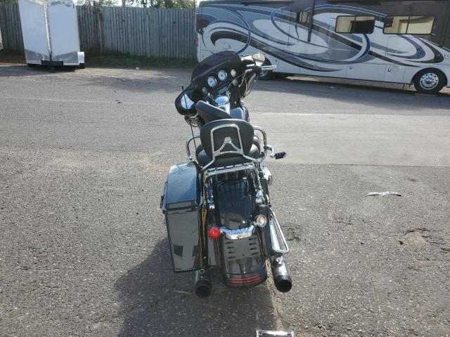 1HD1KB412BB633649 - 2011 HARLEY-DAVIDSON FLHX BLACK photo 4