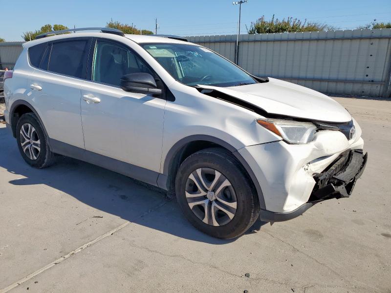 2T3ZFREV2GW248349 - 2016 TOYOTA RAV4 LE WHITE photo 4
