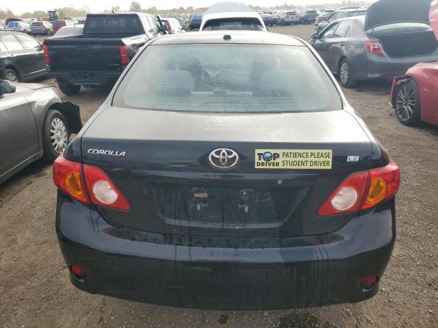 1NXBU4EE4AZ292704 - 2010 TOYOTA COROLLA BASE Schwarz Foto 6