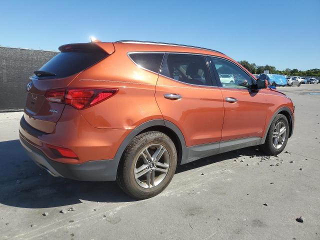 5XYZU3LB1HG492456 - 2017 HYUNDAI SANTA FE S ORANGE photo 3