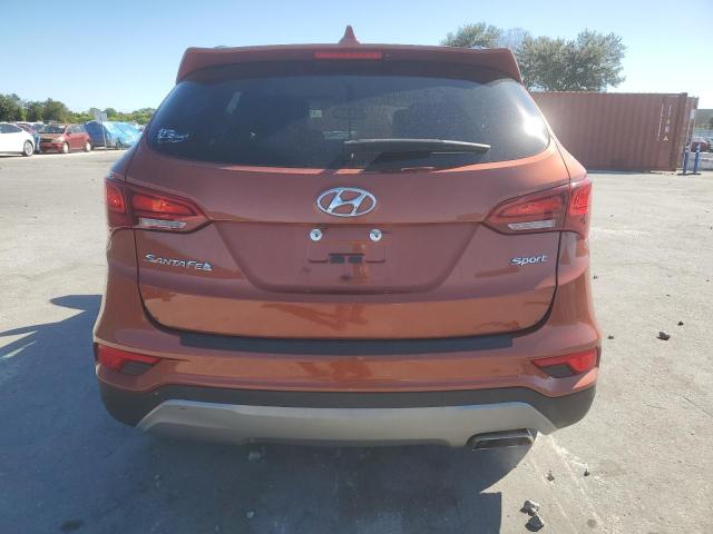 5XYZU3LB1HG492456 - 2017 HYUNDAI SANTA FE S ORANGE photo 6