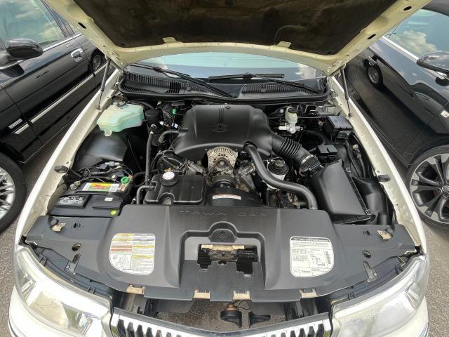 1LNHM81W5XY679473 - 1999 LINCOLN TOWN CAR EXECUTIVE WHITE photo 7