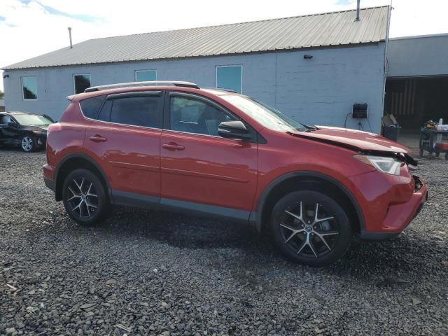JTMJFREV6HJ166217 - 2017 TOYOTA RAV4 SE RED photo 4