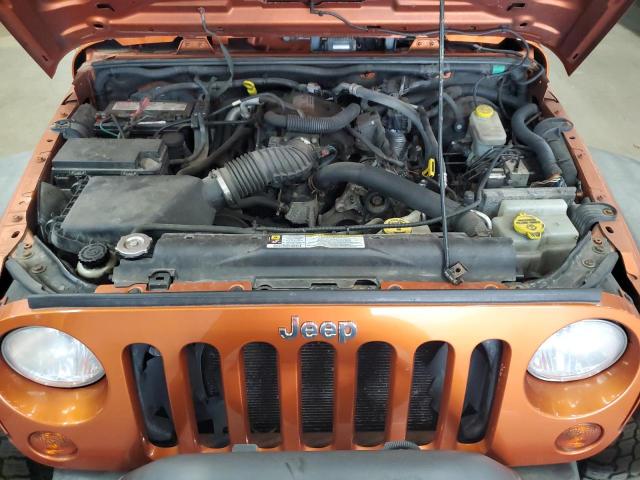 1J4AA2D14AL216962 - 2010 JEP WRANGLER SPORT ORANGE photo 12