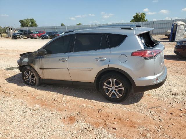 2T3ZFREV8HW341426 - 2017 TOYOTA RAV4 LE SILVER photo 2