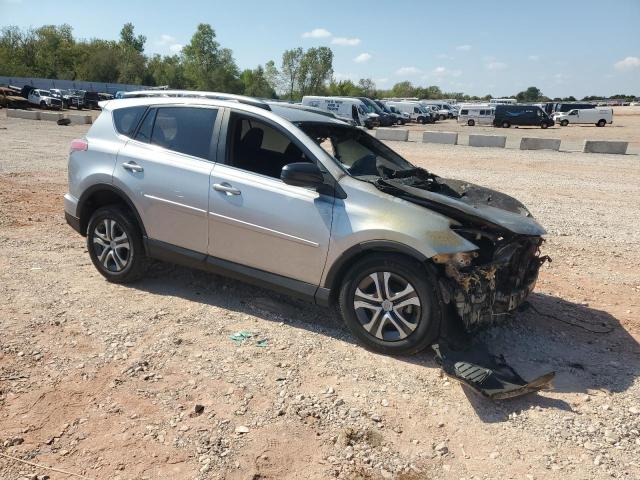 2T3ZFREV8HW341426 - 2017 TOYOTA RAV4 LE SILVER photo 4