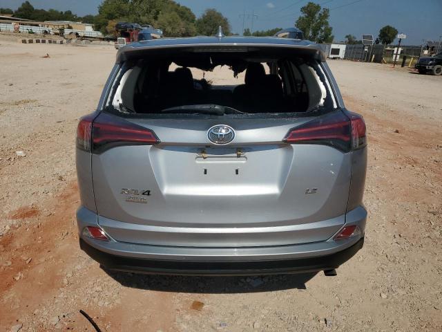 2T3ZFREV8HW341426 - 2017 TOYOTA RAV4 LE SILVER photo 6