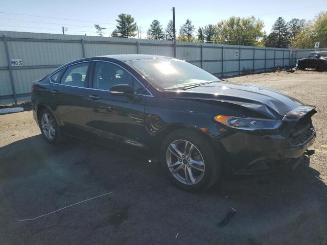 3FA6P0HD8JR114302 - 2018 FORD FUSION SE BLACK photo 4