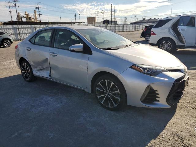 5YFBURHE6HP692946 - 2017 TOYOTA COROLLA L SILVER photo 4