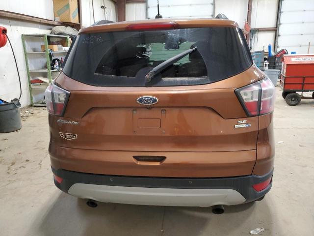 1FMCU9GD9HUB54897 - 2017 FORD ESCAPE SE ORANGE photo 6