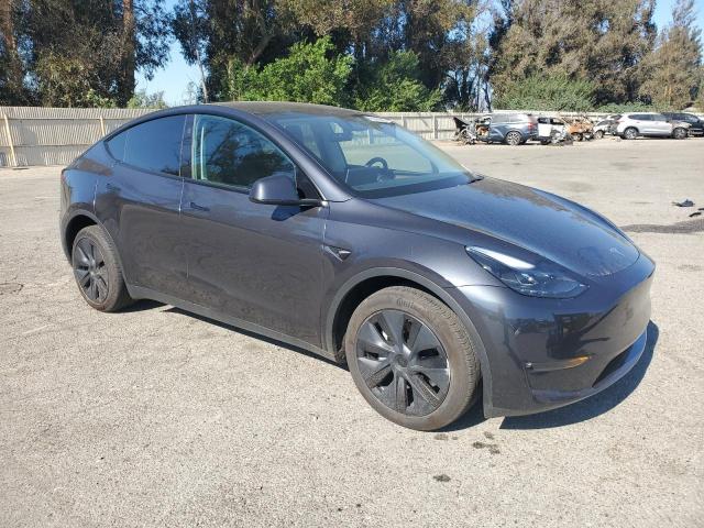 7SAYGDEE1RF198826 - 2024 TESLA MODEL Y ნაცრისფერი ფოტო 4