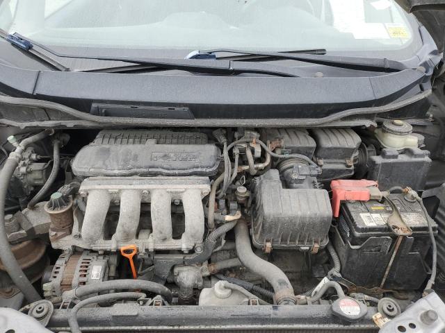 JHMGE87429S012352 - 2009 HONDA FIT SPORT WHITE photo 11