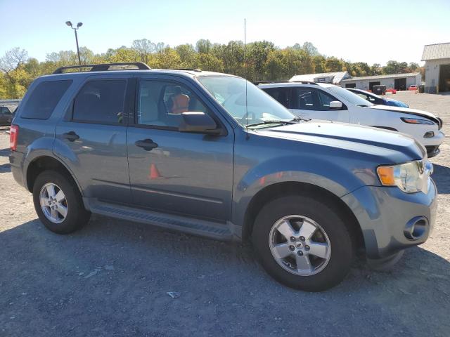 1FMCU9D78BKB18572 - 2011 FORD ESCAPE XLT BLUE photo 4