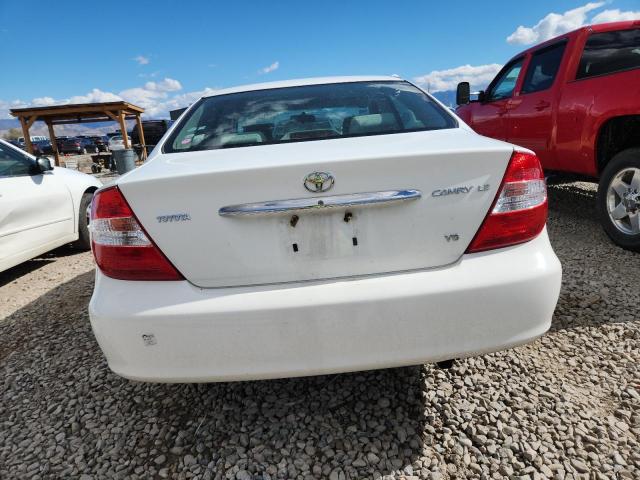 4T1BF30K74U067120 - 2004 TOYOTA CAMRY LE WHITE photo 6