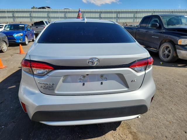 5YFHPMAEXMP195472 - 2021 TOYOTA COROLLA LE SILVER photo 6