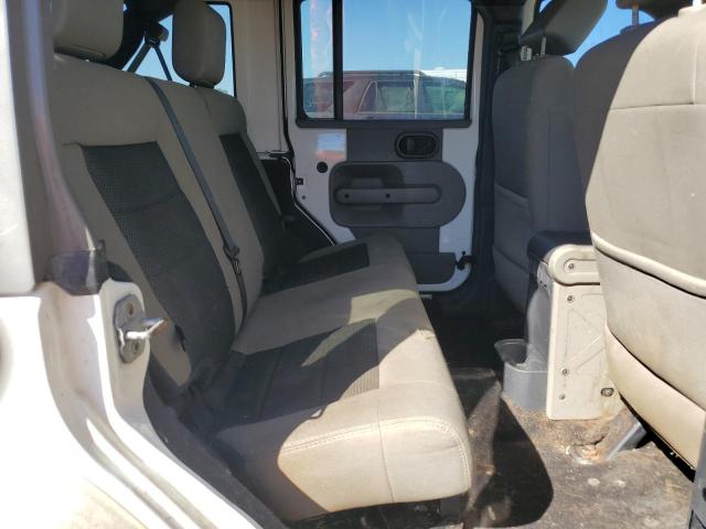 1J4HA5H19AL195181 - 2010 JEEP WRANGLER U SAHARA WHITE photo 11