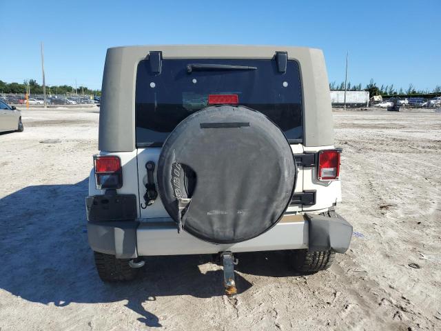 1J4HA5H19AL195181 - 2010 JEEP WRANGLER U SAHARA WHITE photo 6