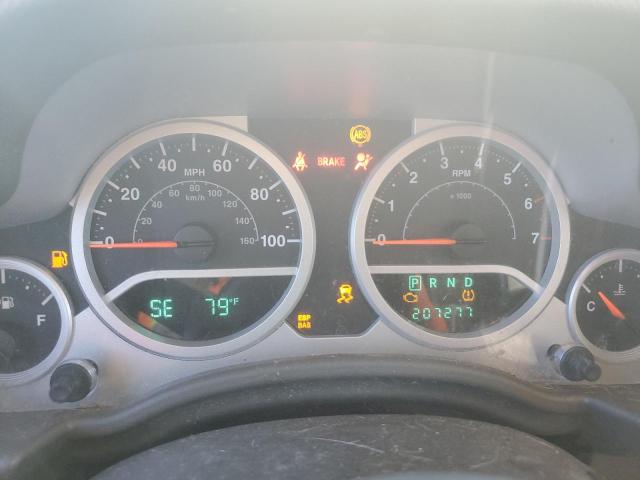 1J4HA5H19AL195181 - 2010 JEEP WRANGLER U SAHARA WHITE photo 9