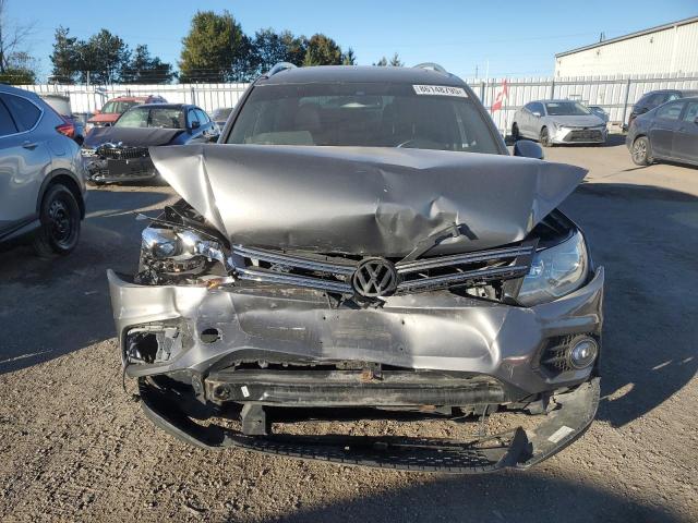 WVGJV3AX0EW026391 - 2014 VOLKSWAGEN TIGUAN S GRAY photo 5