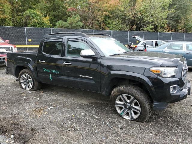 3TMGZ5AN4HM067611 - 2017 TOYOTA TACOMA DOUBLE CAB BLACK photo 4